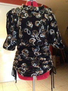 Skirt ties drawn up and shoulder ties as well